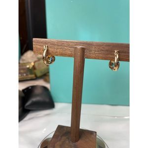 Sterling silver gold vermeil blue topaz huggy earrings